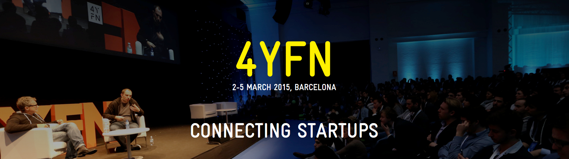 4YFN 2015 Barcelona conference banner, panel discussion on stage and a full audience.