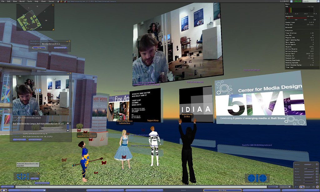 Screenshot of a 3D virtual-world interface (Second Life) showing avatars and video screens displaying live video streams.