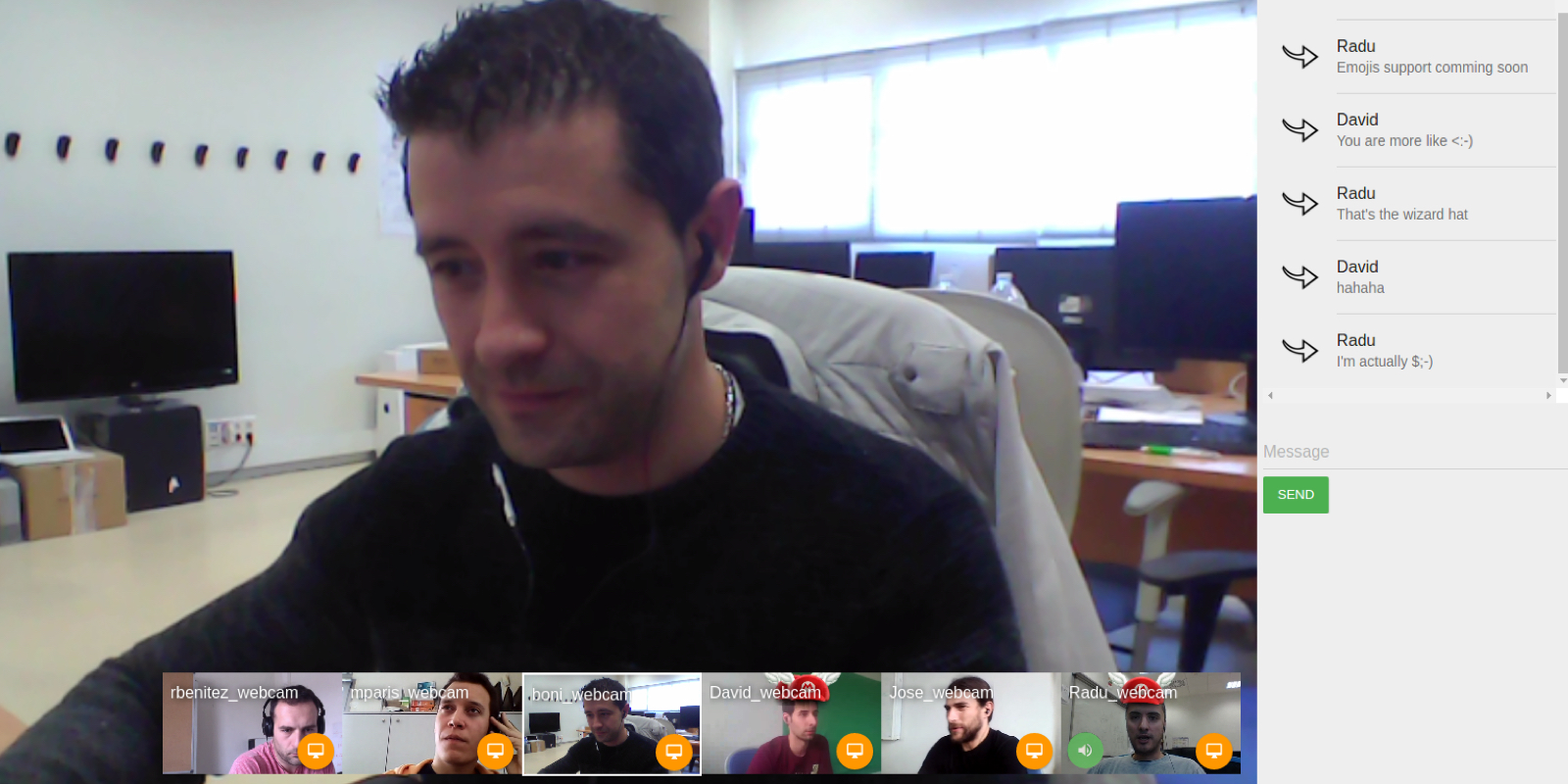 Screenshot of a NuboMedia video chat demo showing a webcam feed, participant thumbnails, and a text chat panel.